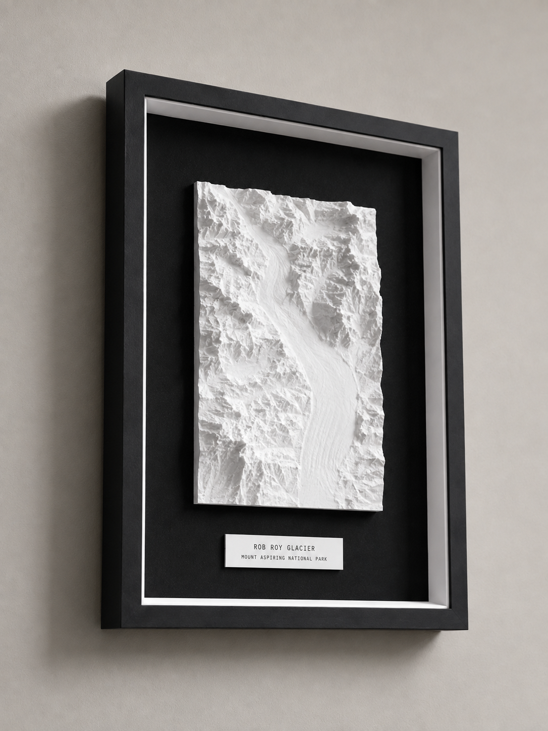 A framed white topographic relief of Rob Roy Glacier